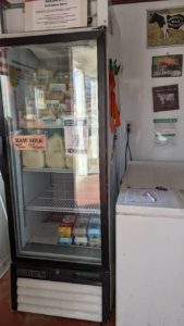 the fridge and freezer inside the farm store