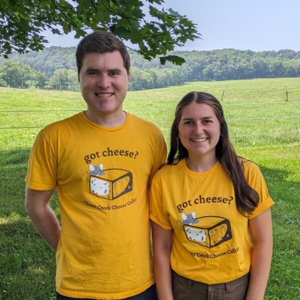 two people wearing got cheese shirts