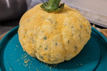 A pumpkin cheese ball ready to serve