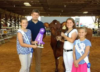 Vannika and Holly recieving Grand Champion