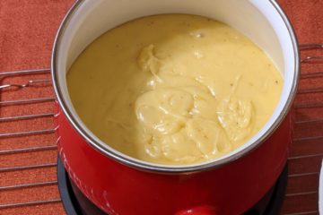 a pot holding delicious fondue for your football party