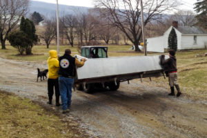 Hauling the new cheese vat down from the barn to the creamery was the easy part