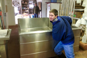 Austin thought he could push our old cheese vat out all by himself