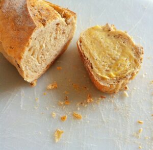 baked bread with yellow butter